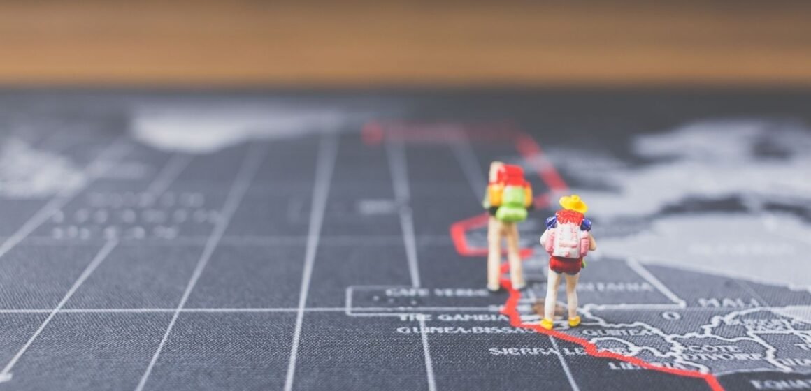 Miniature people on US map, showing roadmap.